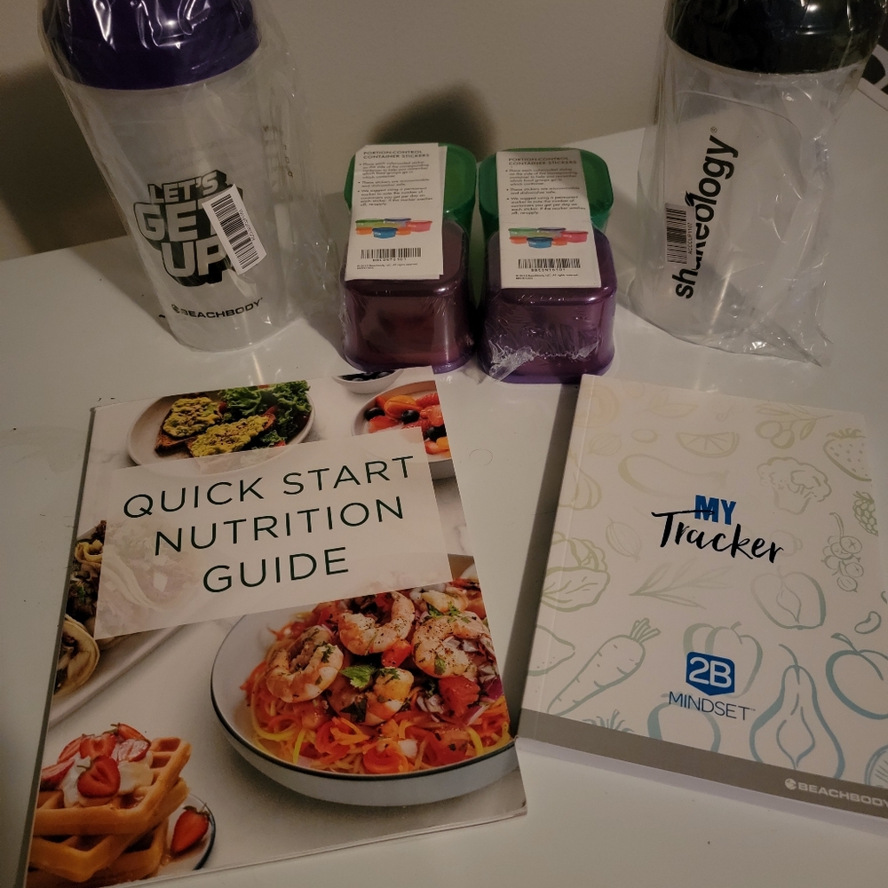 Beachbody food containers, shaker cups, nutrition book, food tracker